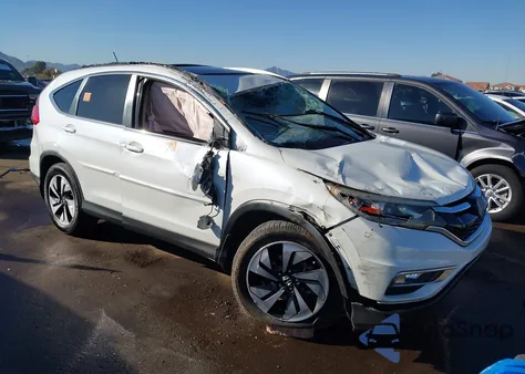 2015 Honda Cr-V Touring из США, поврежденный, VIN 5J6RM4H94FL033722